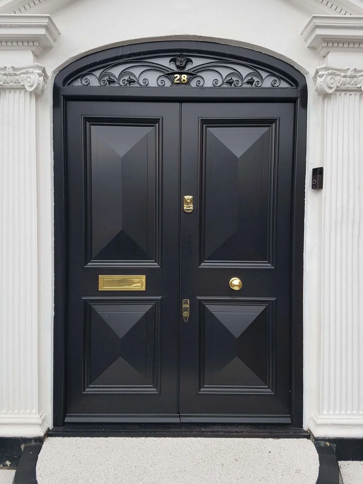 Anthracite double steel security front doors with diamond-bevel panels and arched fanlight